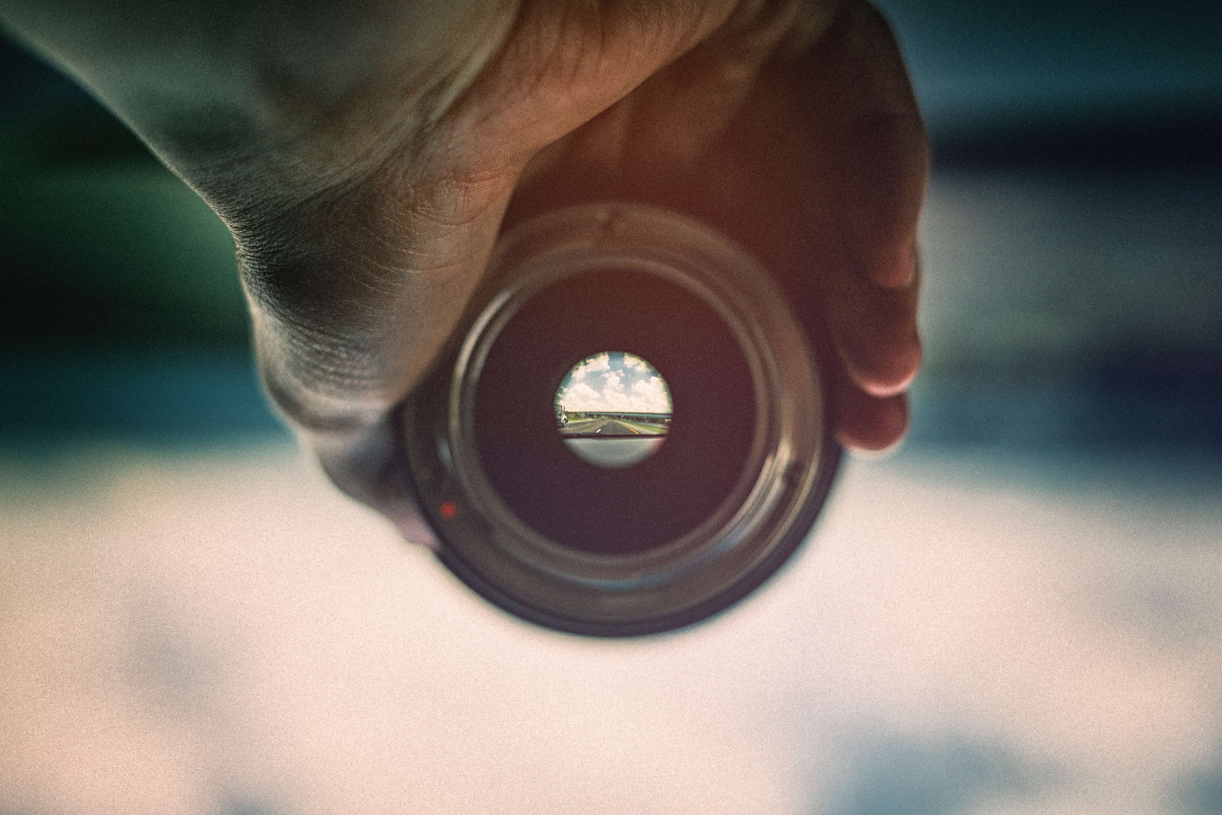 Image of a lens showing clarity on a landscape image