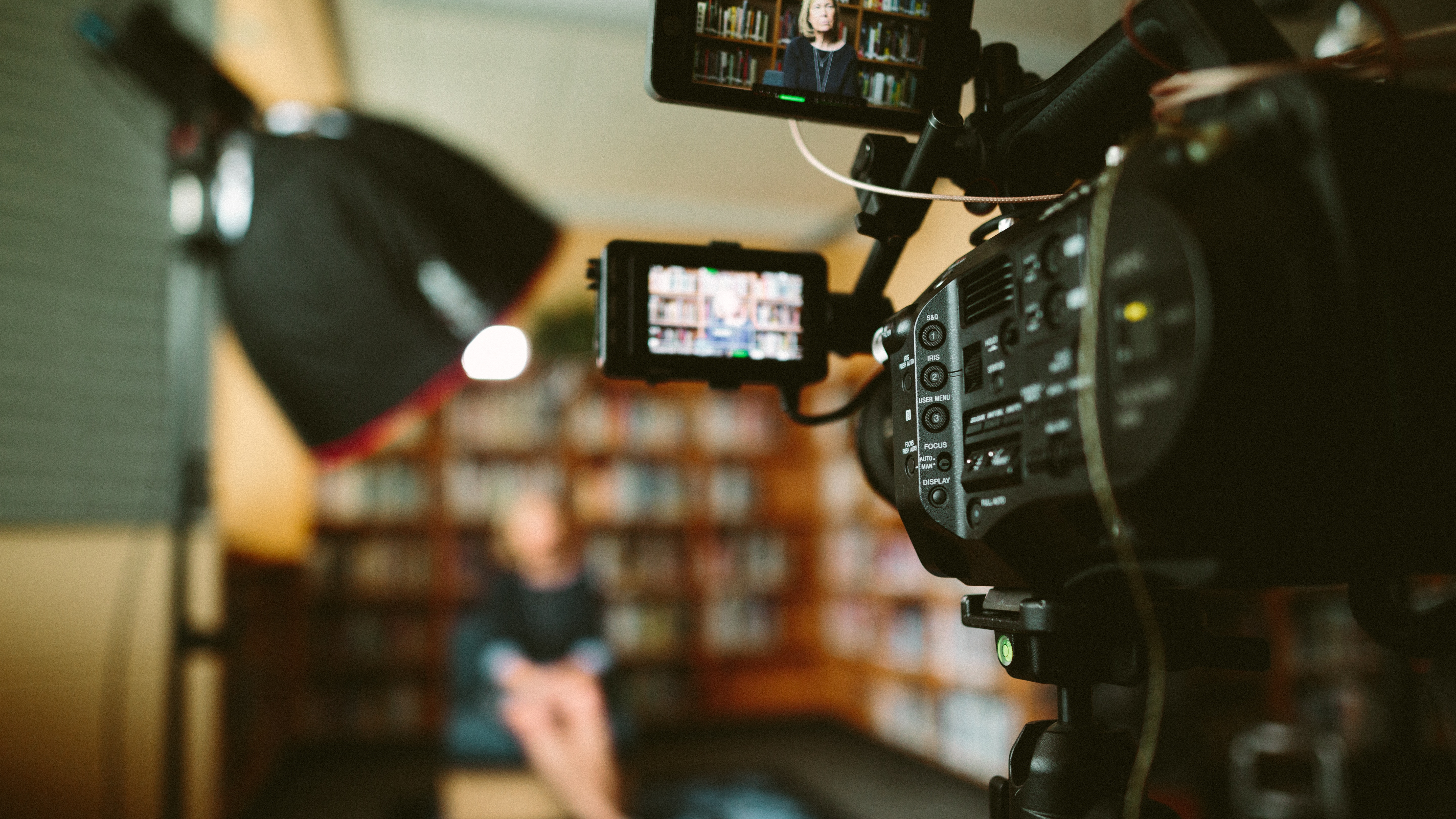 woman in front of camera being filmed