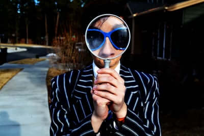 Man magnifying glass